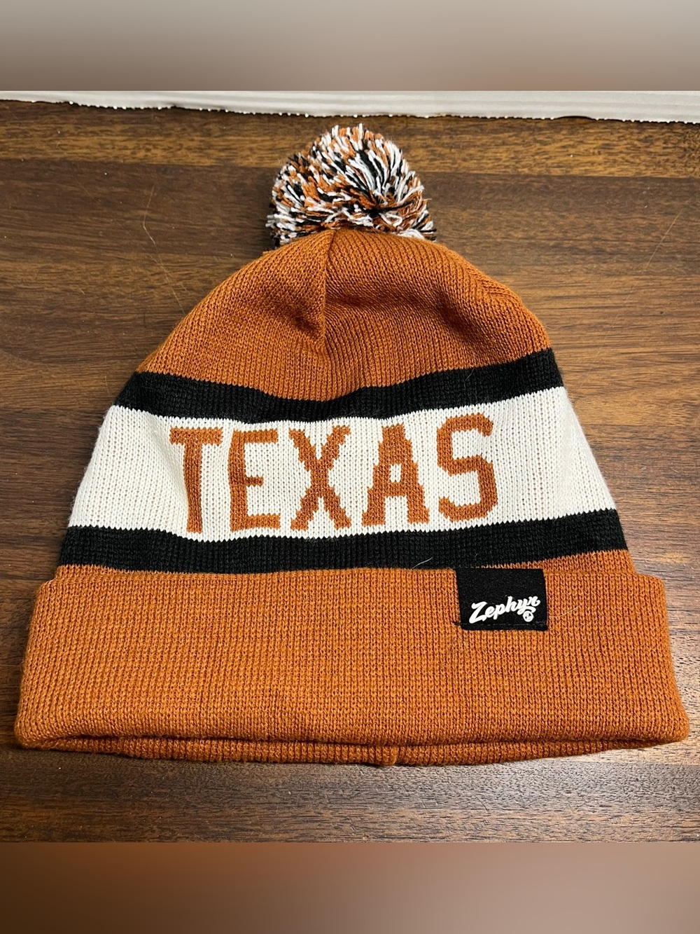 Zephyr burnt orange Texas pom Pom beanie hat winter